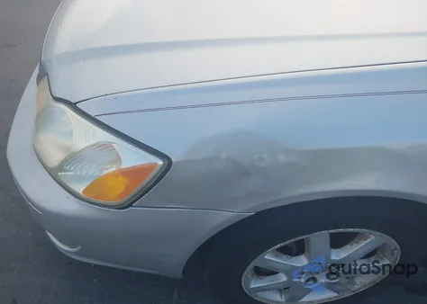 2002 Toyota Avalon Xls z USA, uszkodzony, nr VIN 4T1BF28B12U211028